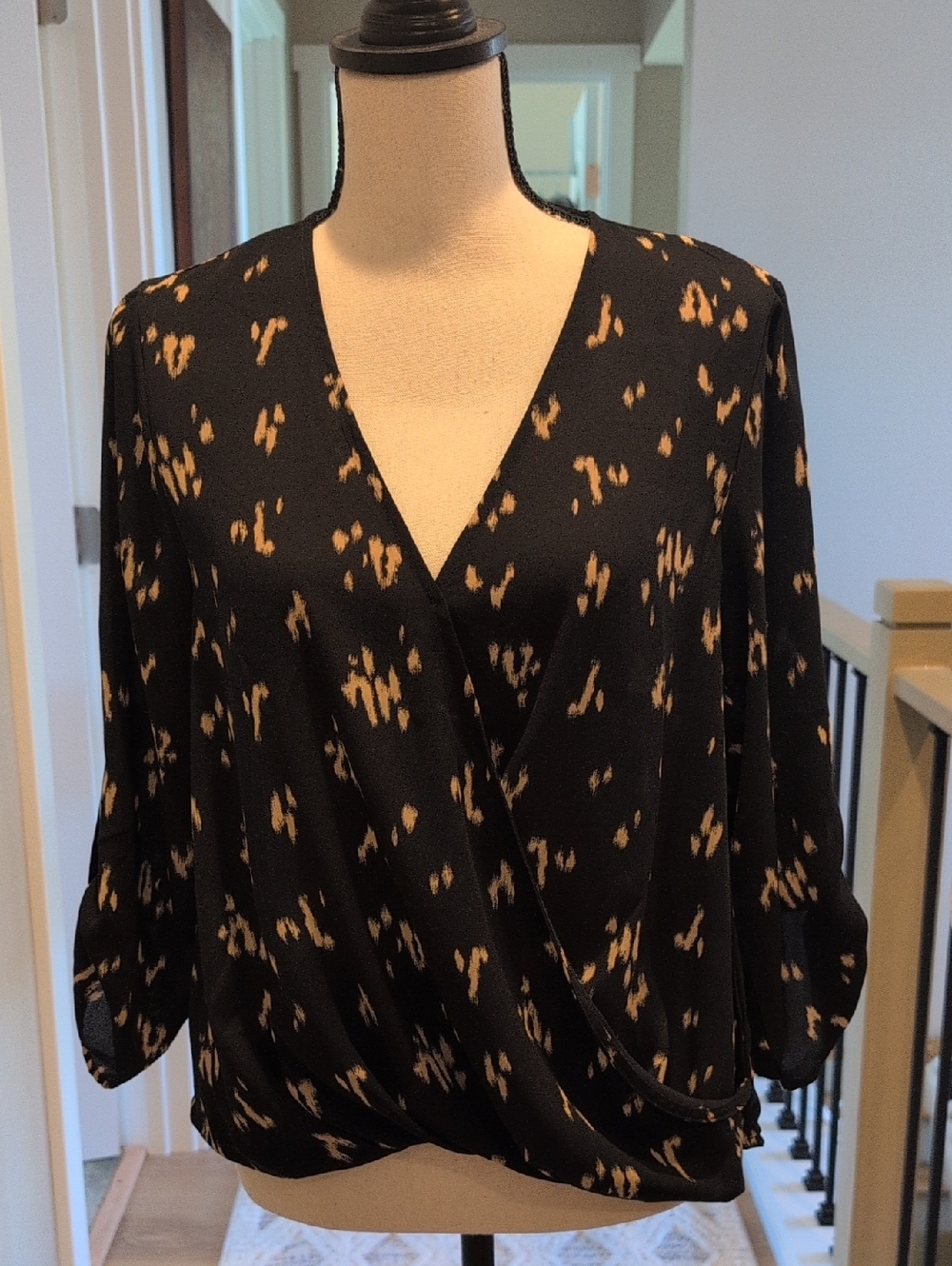All in Favor Black Wrap-Front Blouse with Tan Print